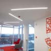 recessed lighting into ceiling in red themed office