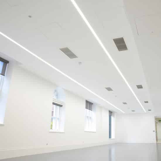 white building with white recessed lighting