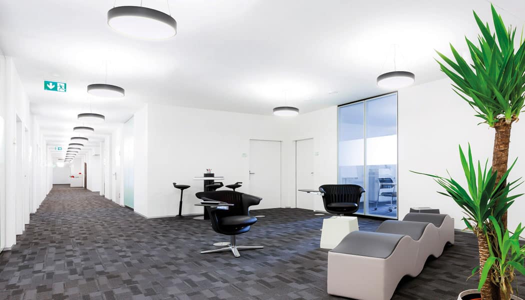 small circular lighting in white office