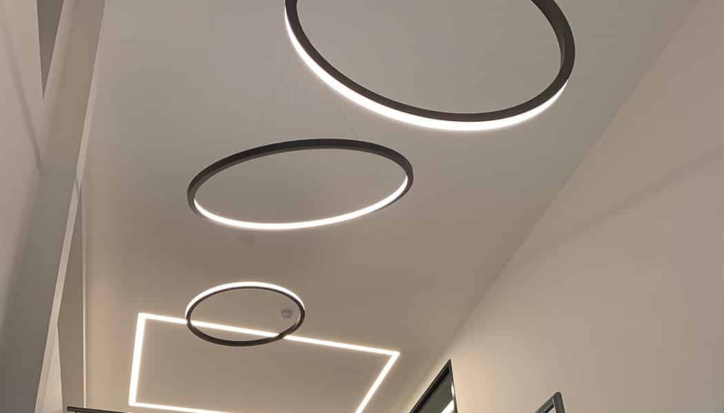 three m-line circular lighting products in a row