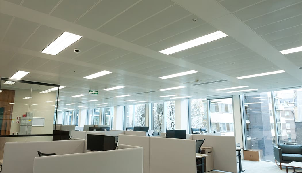 suspended lighting in white ceilings and office