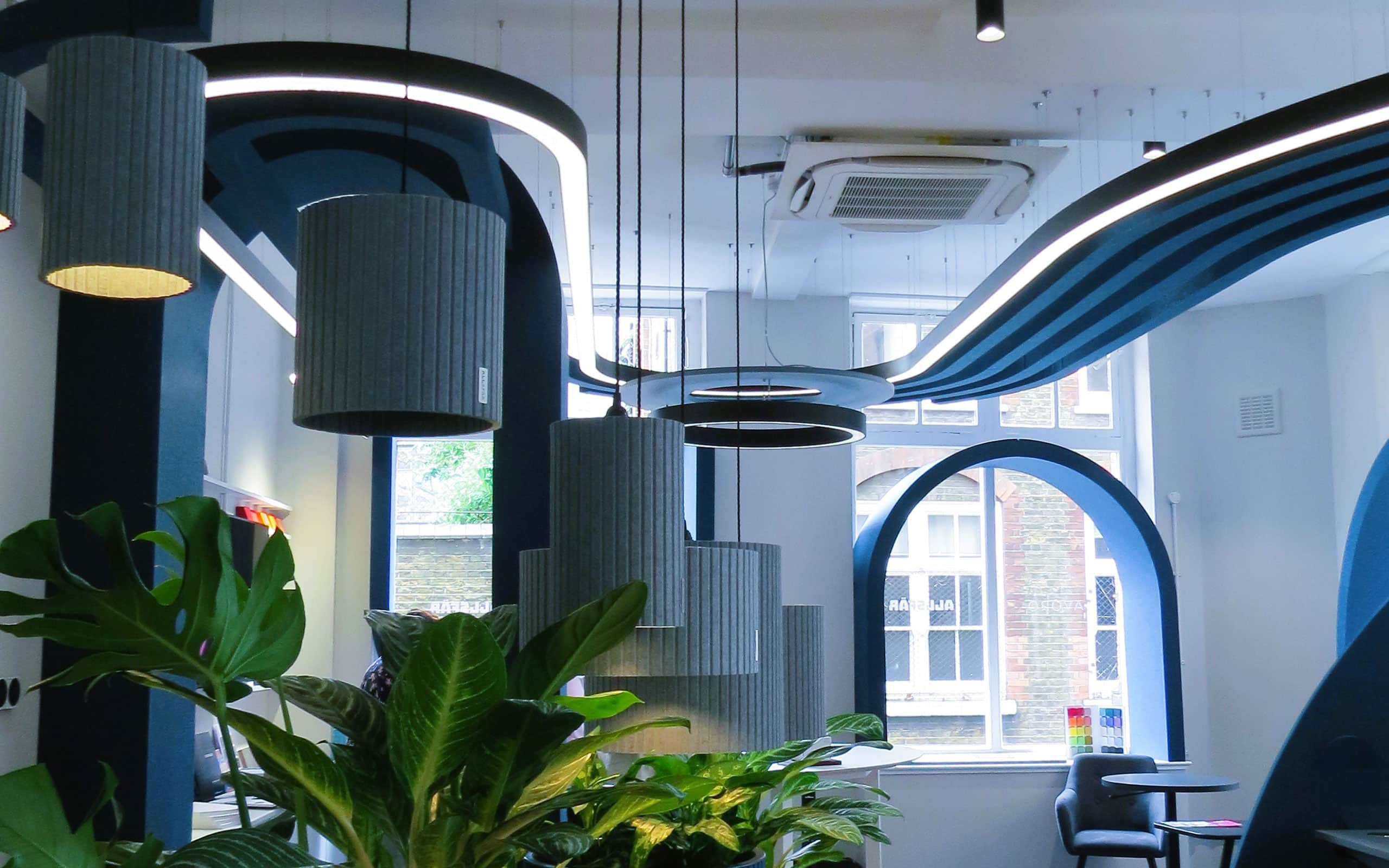 Curved Acoustic LED Lights in Luxury Office Space and Showroom