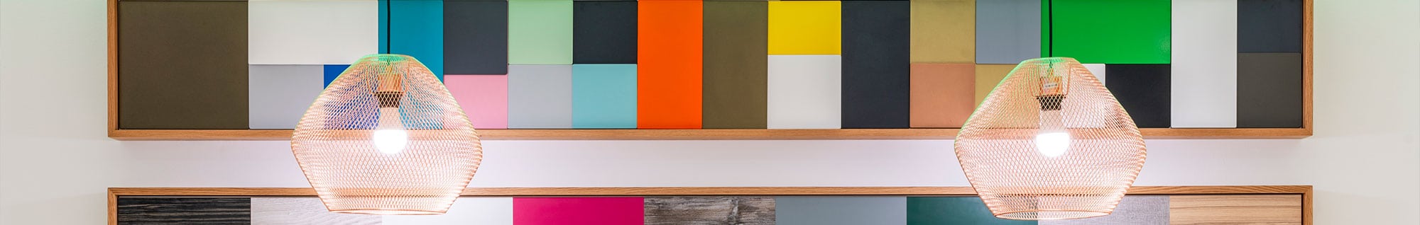 Lyra Copper Mesh Pendants Featured in Luxury Office Furniture Showroom
